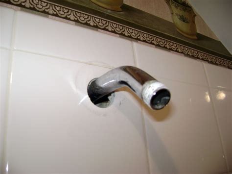 shower arm leaking in wall|How to Fix a Leaking Shower Arm